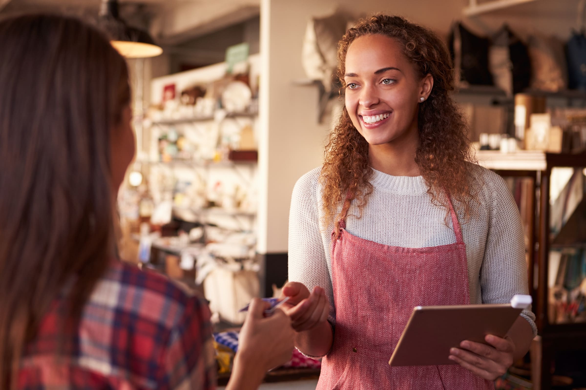 Business Owner Making Sale to Customer